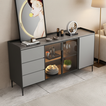 Modern sideboard with decorative items in a room with a painting on the wall.