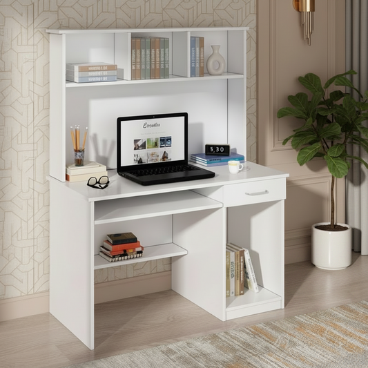 White computer desk with shelves, laptop, and books in a room with a cactus plant.