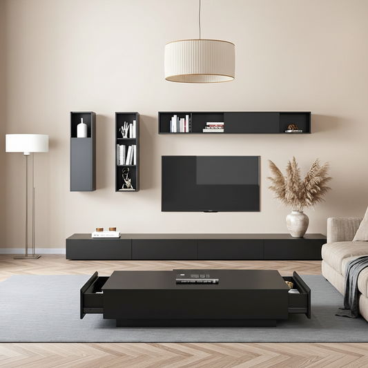 Modern living room with black entertainment unit, TV, and decor.