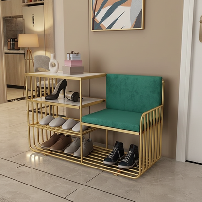 Gold shoe rack with green cushioned seat in a room setting
