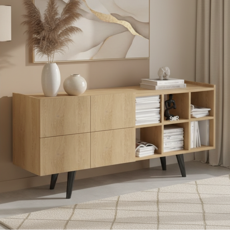 A light oak wood sideboard cabinet with black legs, styled in a modern room setting against a white wall with a large black circular wall art piece and a mounted bull skull.