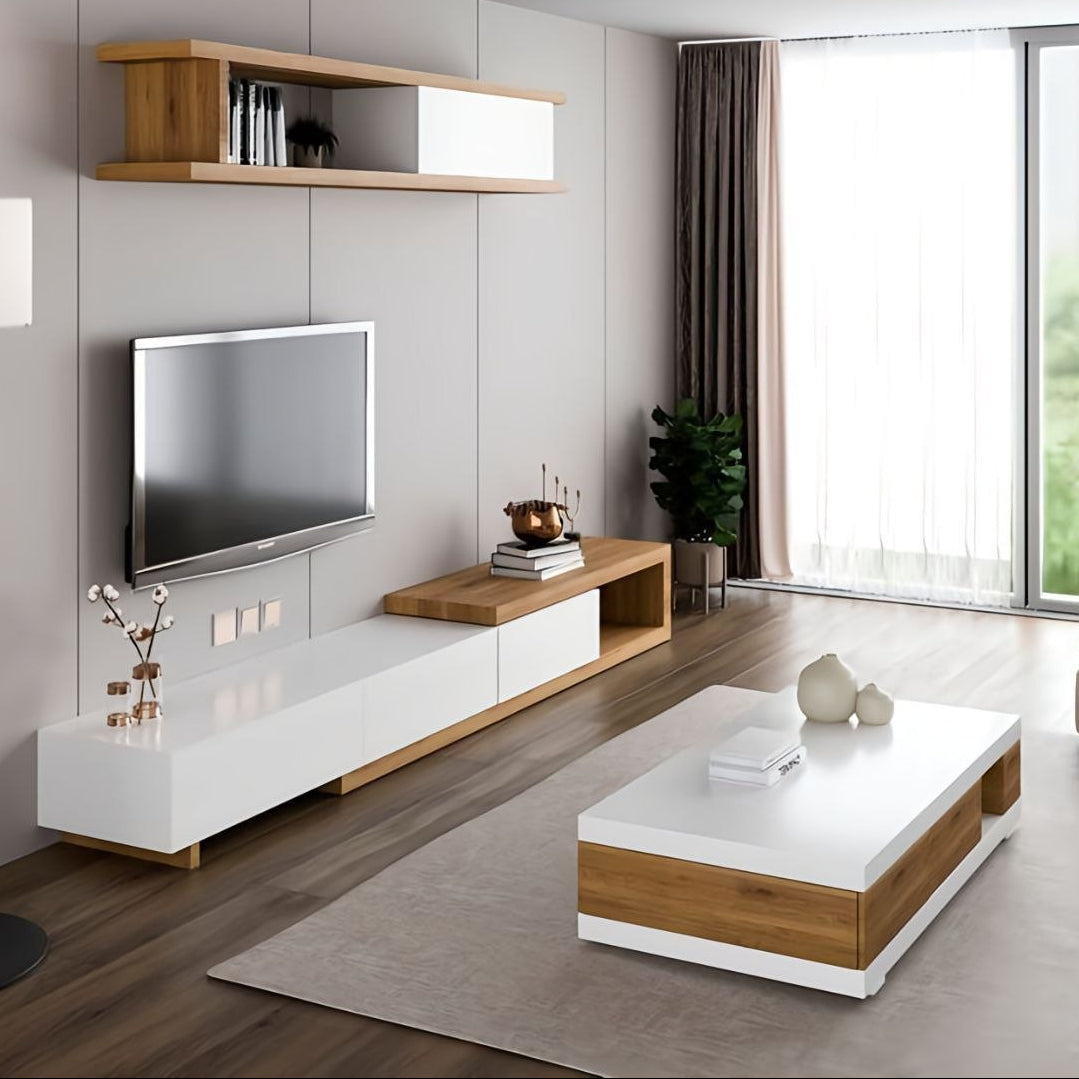 Modern living room with a TV unit, coffee table, and decorative items.